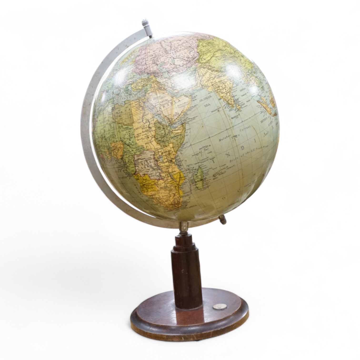 A vintage revolving globe with inset compass to the base, 55cm high